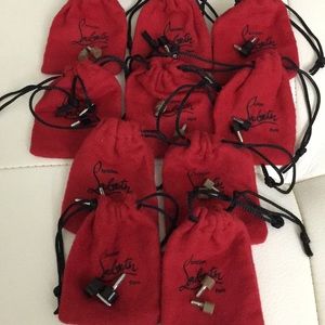 Authentic Christian Louboutin pouches with tips